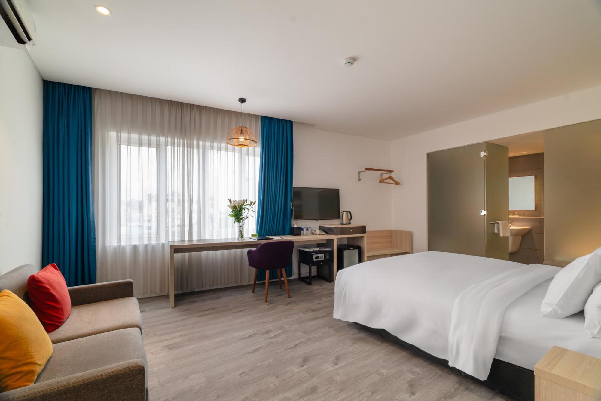 Liberty Hotel Saigon Greenview Хошимін Екстер'єр фото